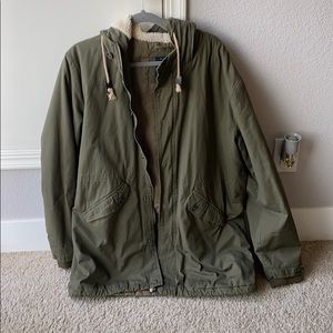 Green jacket with Sherpa lined hood